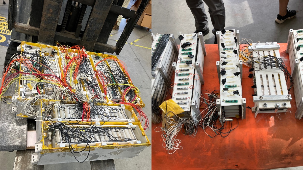 A custom EV battery pack being dismantled